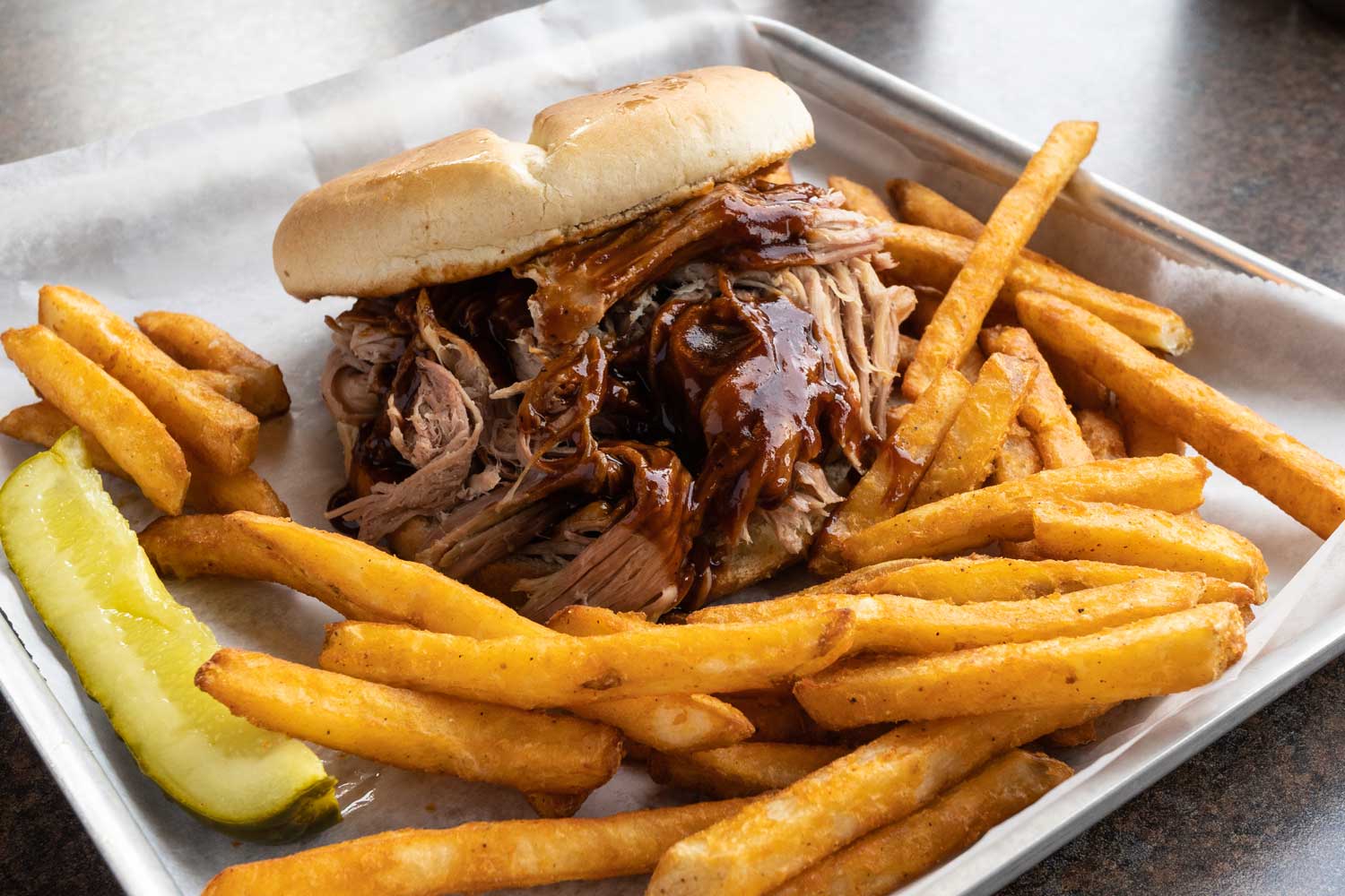 pulled pork burger with fries