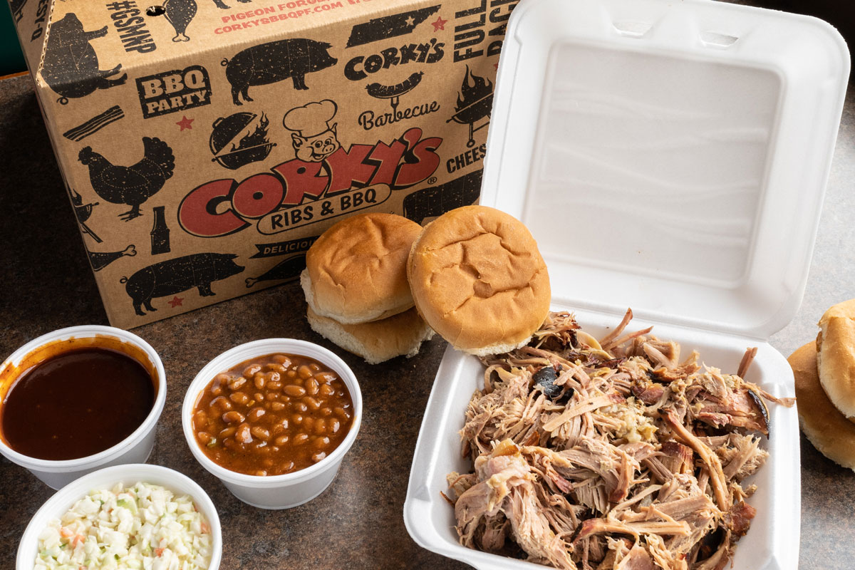 pulled meat with buns and sides from Corky's