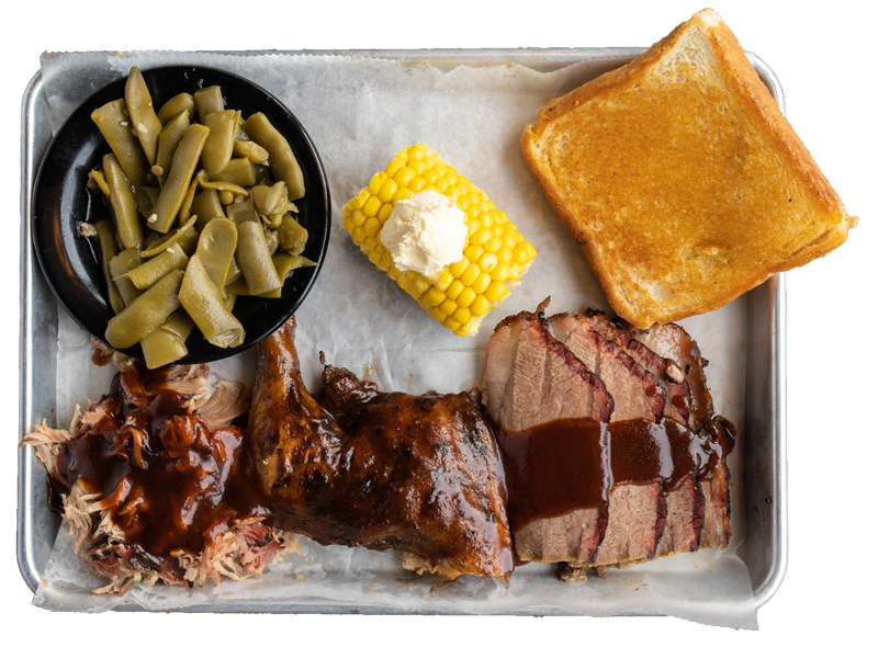 green beans, corn with butter, pulled meat, ham, and toast on a tray