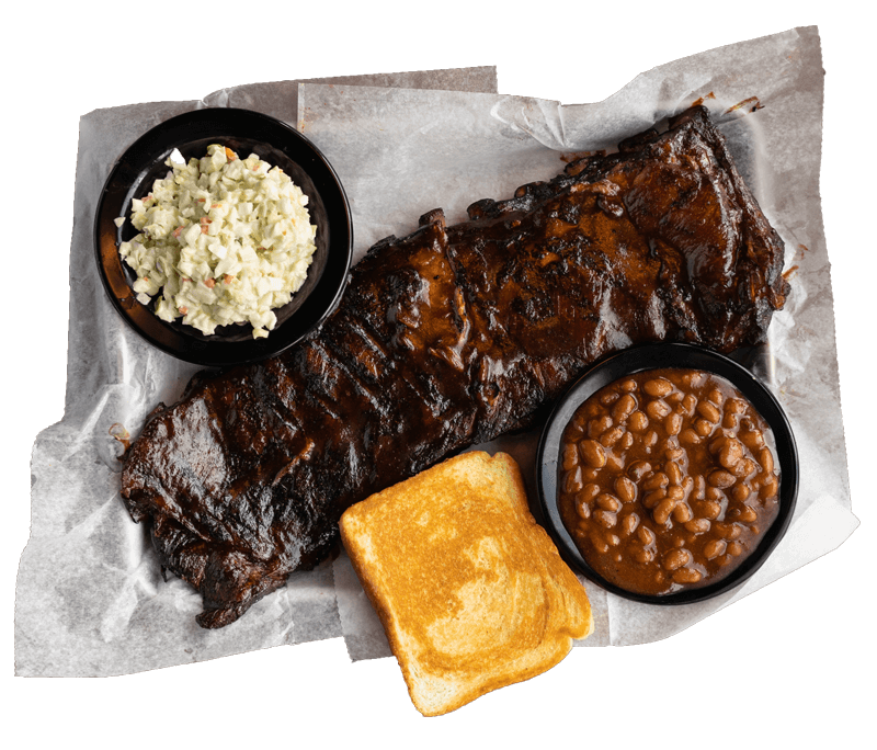 ribs with the beans and coleslaw on a tray